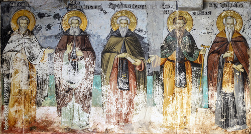Cuadro en lienzo Mount Athos, Greece - March 27, 2017: Timeworn frescoes of saints on the outer s