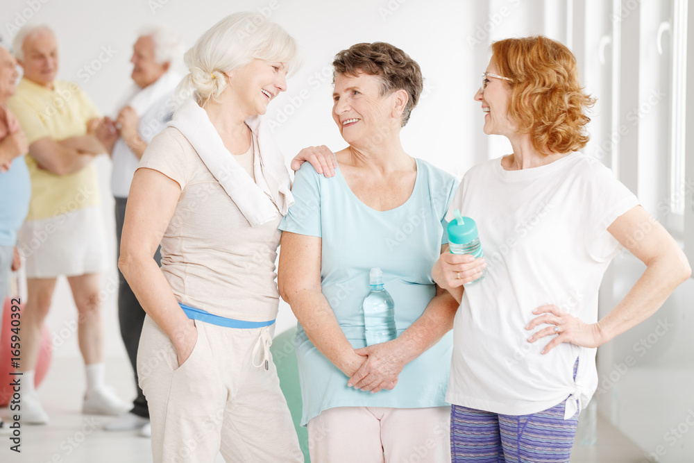 Fototapeta premium Women talking after training