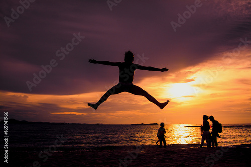Man jumps on the beach