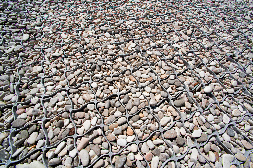 Plastic paver with in it pebbles textures background Plastic paver with in it pebbles textures background