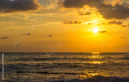 Amazing sea sunset  the sun  waves  clouds