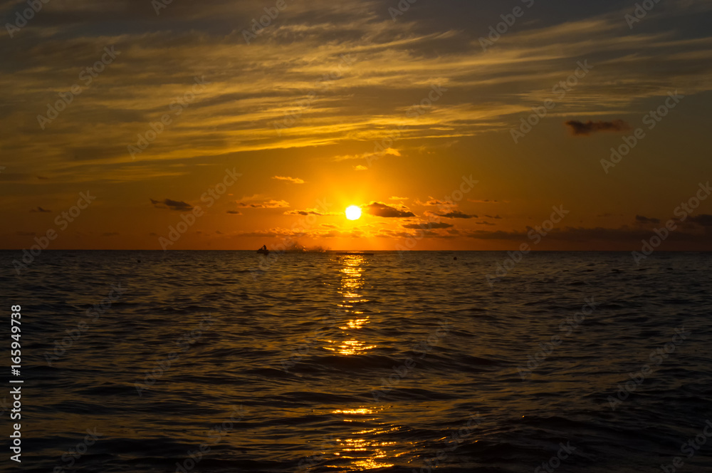 Amazing sea sunset, the sun, waves, clouds