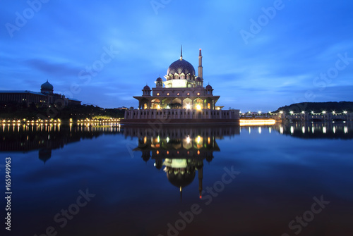 Breathtaking sunrise views with Putra Mosque, Putrajaya,  Malaysia. Charming Islamic architecture.