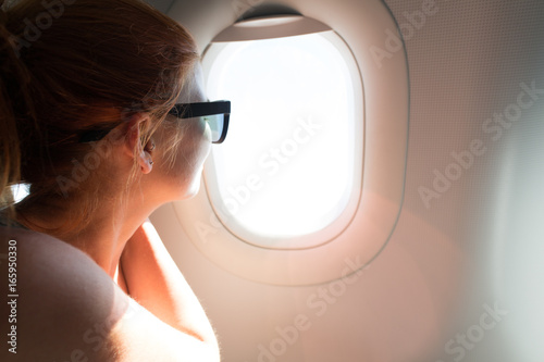 windows plane girl