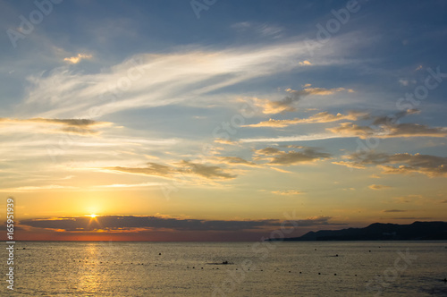 Amazing sea sunset, the sun, waves, clouds