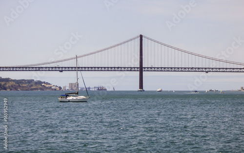 The river Tagus and the bridge 25th of April - Lisbon, Portugal