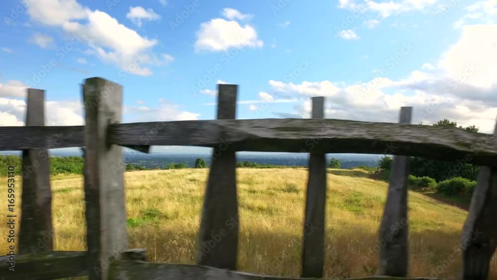 Scenic view behind an old wooden fence in the Worcestershire hills. Scenic view behind an old wooden fence in the Worcestershire hills.