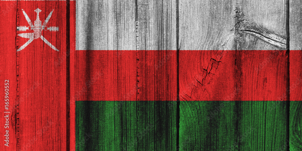 Oman flag painted on wooden wall for background Oman flag painted on wooden wall for background