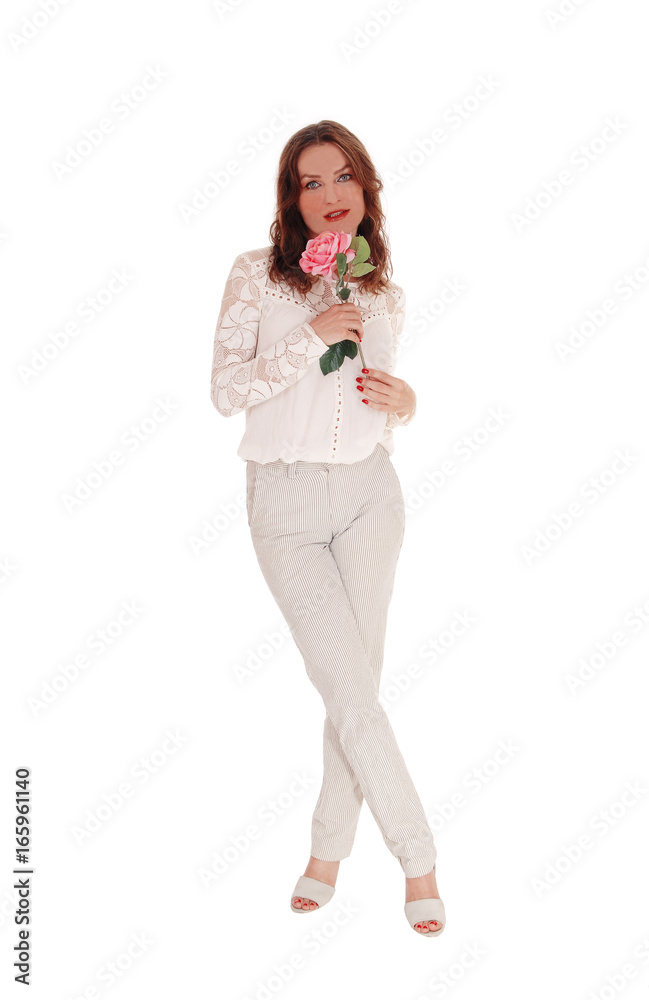 Lovely woman with pink rose standing full body Lovely woman with pink rose standing full body