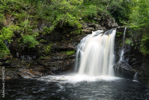 Fototapeta Naklejka Na Ścianę i Meble -  Waterfall in rocks and trees