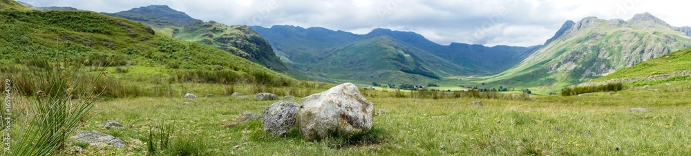 Panorama landscape mountains stone grass meadow Panorama landscape mountains stone grass meadow