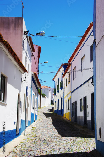 Narrow street in the village of Torrao, Alentejo, Portugal photo