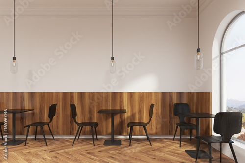 Modern black furniture cafe interior, window