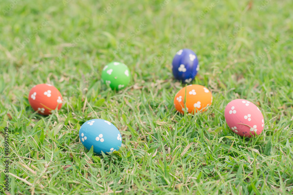 Colorful easter eggs on green grass Colorful easter eggs on green grass