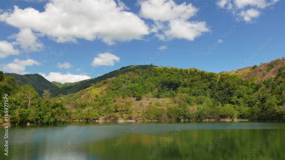 A time lapse video showing the idyllic beauty of the mountain lake Balanan in Negros Oriental, Philippines. Small waves can be seen forming as the wind gets stronger. A time lapse video showing the idyllic beauty of the mountain lake Balanan in Negros Oriental, Philippines. Small waves can be seen forming as the wind gets stronger.