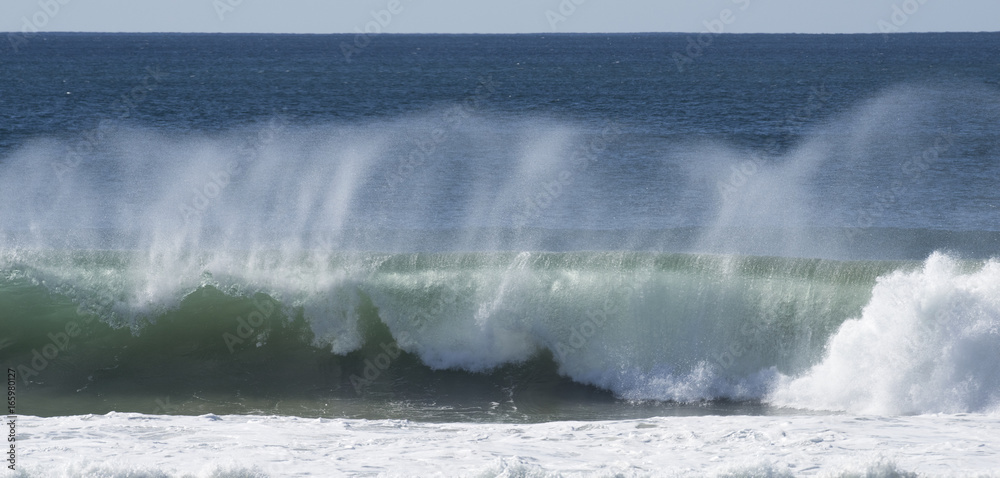 Ocean surf breaking along the Queensland coast, Australia