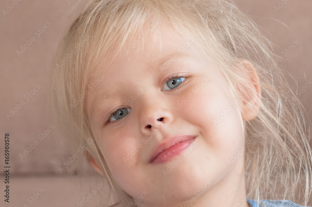 Portrait of a little girl with blue eyes and blond hair Portrait of a little girl with blue eyes and blond hair