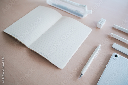 Office desktop ready for work . white stationery on a light wooden surface.