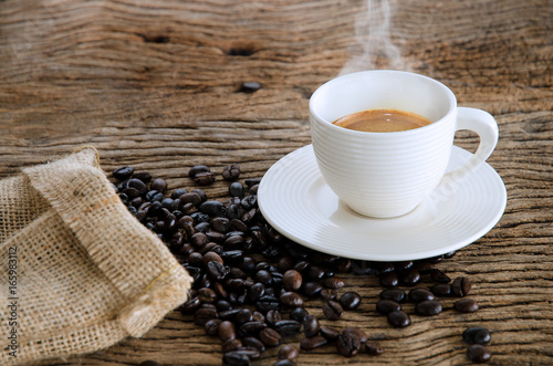 Cup Of Coffee On Wood Table.