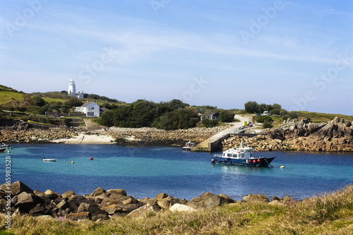 View across Porth Conger to St Agnes from Gugh, with the St Agnes Lighthouse, Isles of Scilly, Cornwall, England, UK. photo