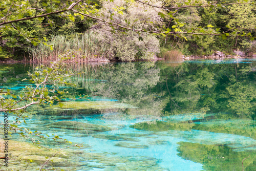 Fototapeta Naklejka Na Ścianę i Meble -  Enchanted Lake. The crystalline waters of Cornino Lake. Friuli