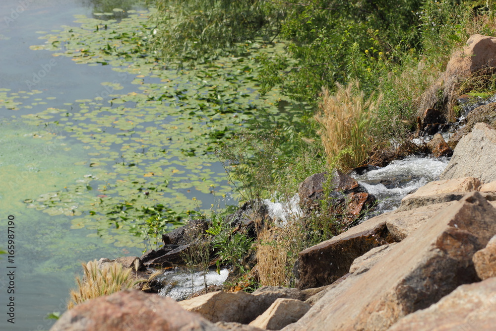 Artificial waterfall of granite boulders Artificial waterfall of granite boulders