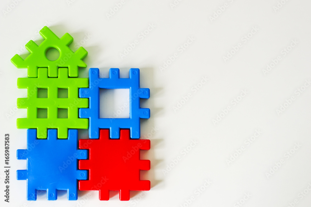 Obraz premium Colorful puzzle made from toys wait for fulfillment. Concept for complete or dream life