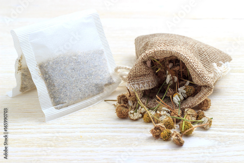 A bag of chamomile tea and a bag of chamomile