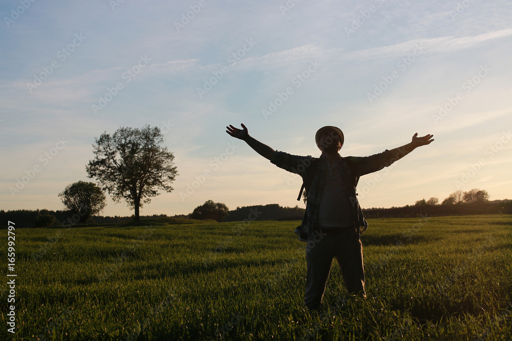 Man in casual clothes is a traveler in the open spaces Man in casual clothes is a traveler in the open spaces
