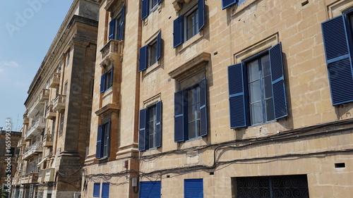 Blue window shutters