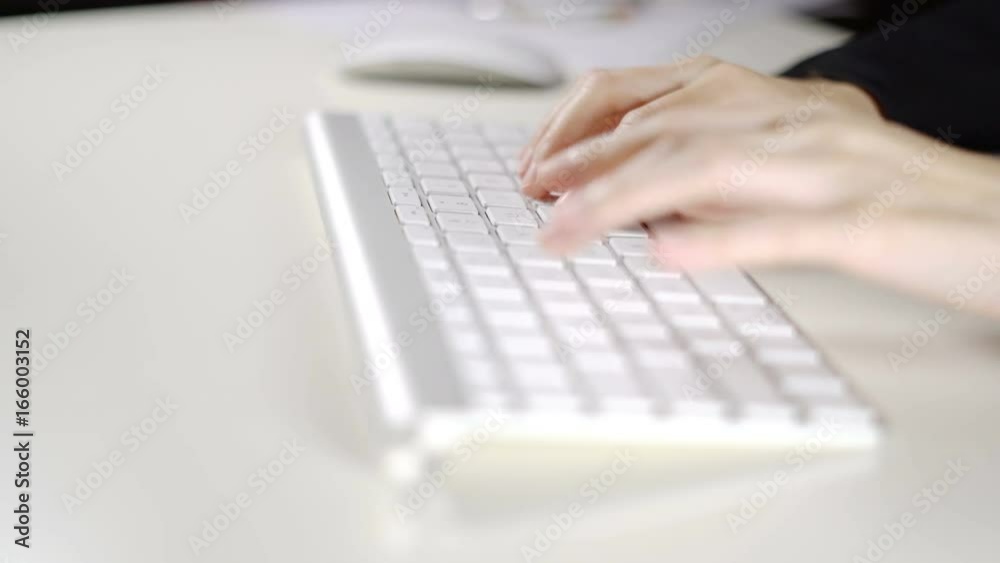 Hand business woman typing on computer keyboard in the office. Hand business woman typing on computer keyboard in the office.