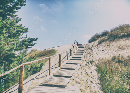 Fototapeta Naklejka Na Ścianę i Meble -  White sand dunes, Nida, Lithuania. Beautiful landscape with blue sky
