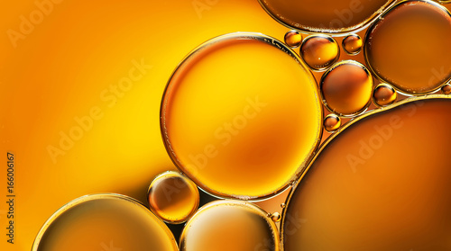 Water bubbles abstract macro, orange abstract background
