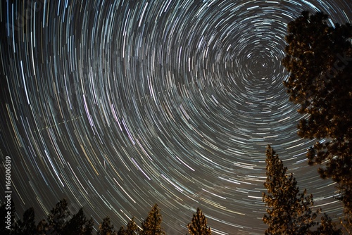 Slika na platnu universe spiraling around north star on night sky