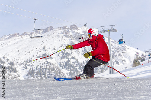 athletes skiing in the mountains