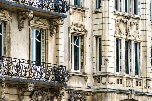 Old but renovated windows in historical part of Bruxelles photo