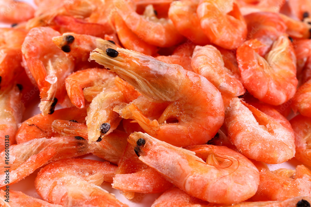 Frozen fresh shrimp on white background (isolated). Snack to beer. Close up