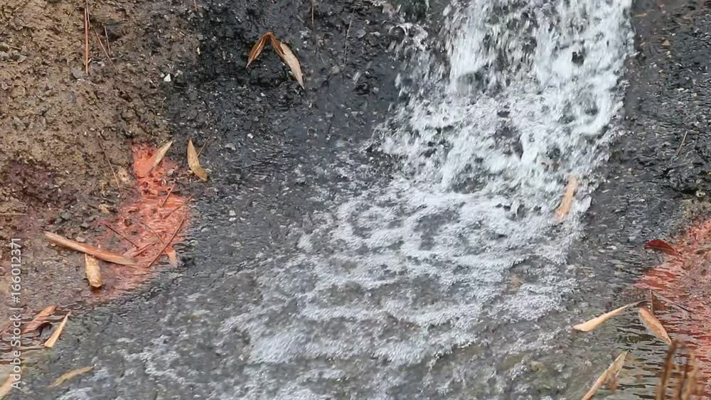 Small Waterfall park with water splash, Decorated and built protect waters. And to moisturize nature. The rest of relaxation for man. Small Waterfall park with water splash, Decorated and built protect waters. And to moisturize nature. The rest of relaxation for man.
