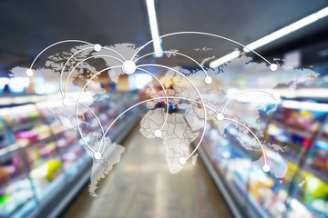 Shelves with products in supermarket, blurred background