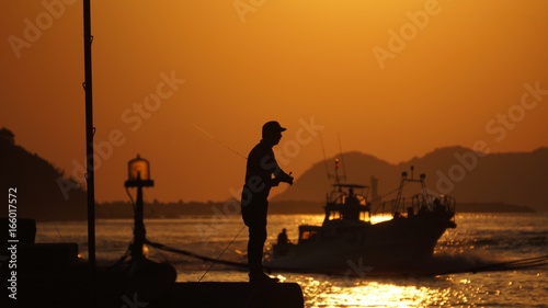 sunset fisherman 
