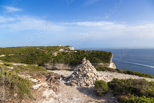 Bonifacio, Corsica, France. Pyramid of stones on the beach