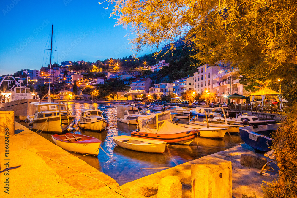 Beautiful Adriatic Beach and Mimice Village in the night, Dalmatia, Croatia Beautiful Adriatic Beach and Mimice Village in the night, Dalmatia, Croatia