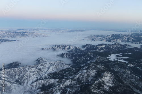 Aerial of Columbia River basin above Wenatchee  Washington with clouds