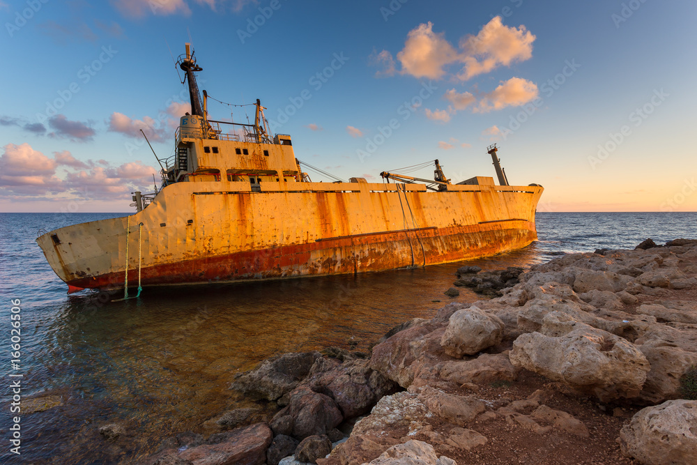 Sea view and shipwreck at sunset in Paphos, Cyprus Sea view and shipwreck at sunset in Paphos, Cyprus