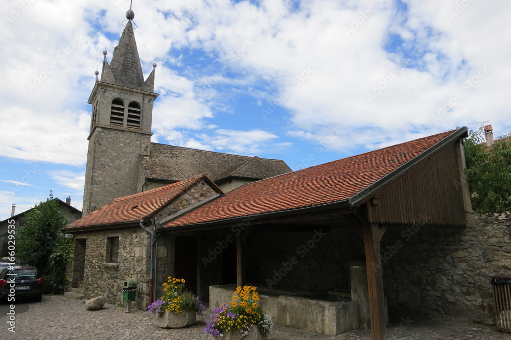 Naklejka premium Fountain in the medieval village of Nernier, Haute-savoie France.