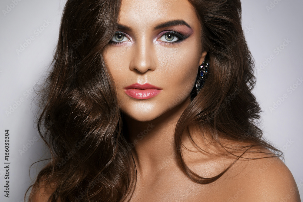 Gorgeous woman with beautiful a make-up and hairstyle Gorgeous woman with beautiful a make-up and hairstyle