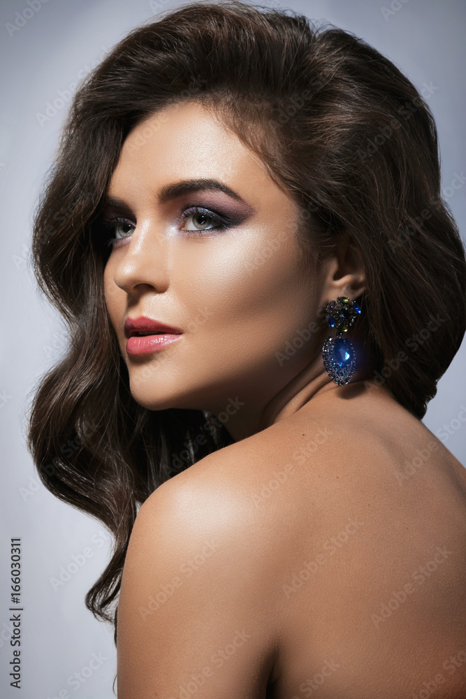 Gorgeous woman with beautiful a make-up and hairstyle Gorgeous woman with beautiful a make-up and hairstyle