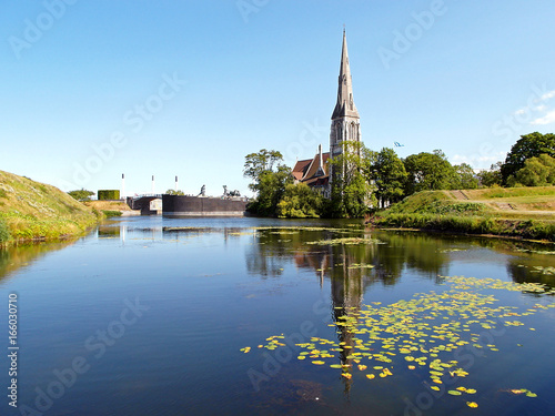 Reflections of St. Alban's Church on the Pond of the Kastellet(Citadel) in Copenhagen, Denmark