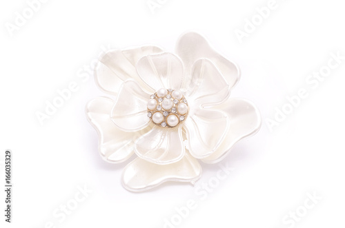 Brooch flower with pearls isolated on white
