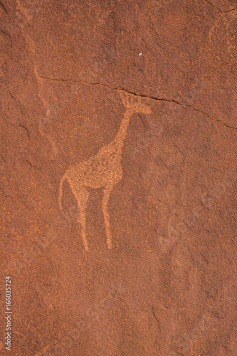 Sandstone engravings in a stone at Twyfelfontein photo